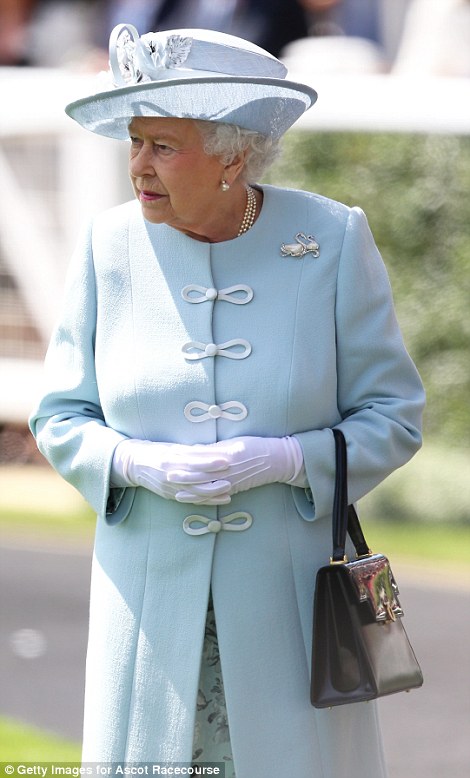 the Queen in a pale blue Angela Kelly coat on day 1 at Royal Ascot 2014