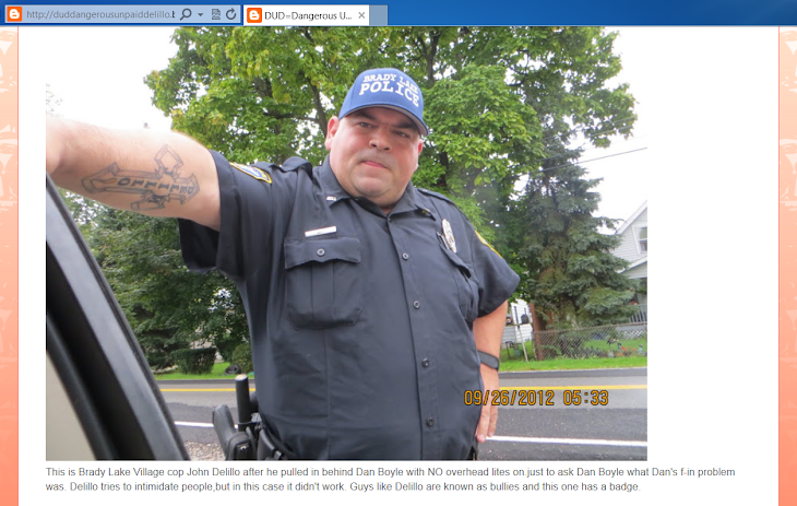 Brady Lake Village cop John Delillo takes shit fits when his picture is taken-WHY ?