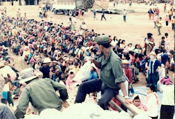 Working for CARE in Cambodian refugee camp distributing food. Can you find me?