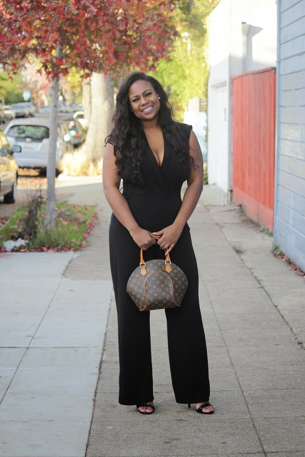 Plus size outfit ideas. Black jumpsuit. Louis Vuitton.