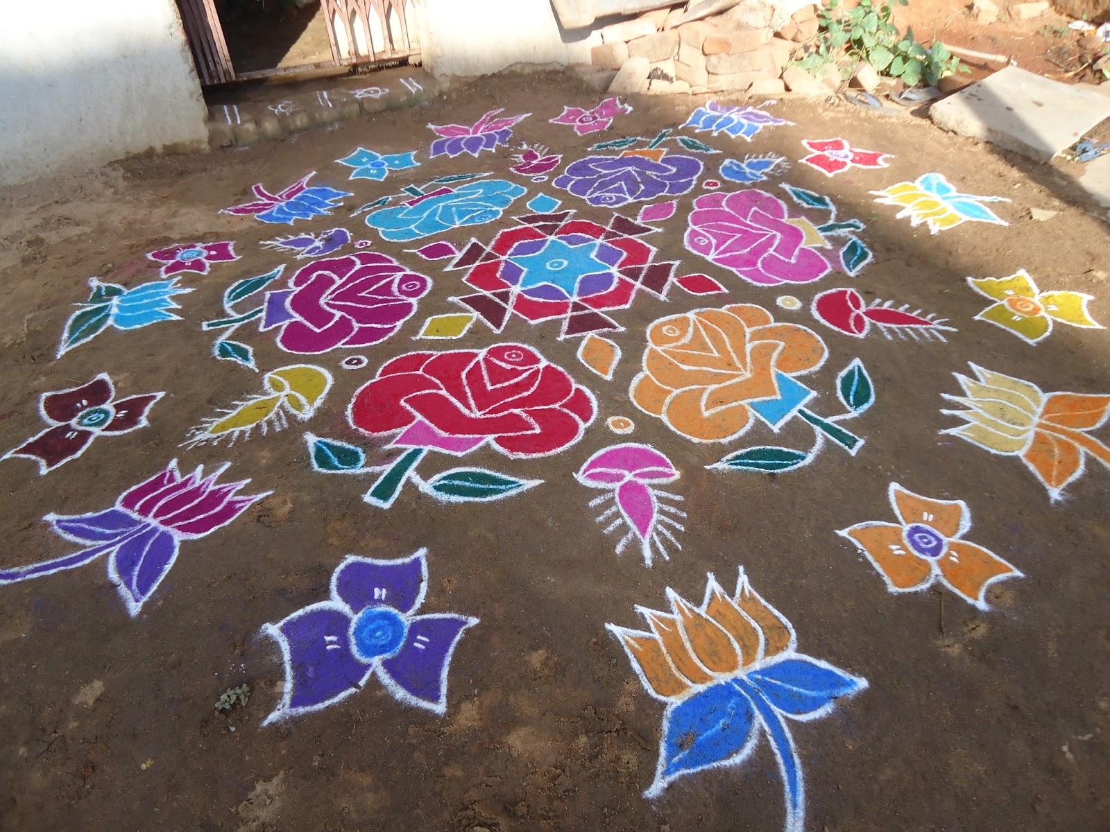Beautiful Kolam and Painting Rose Kolam