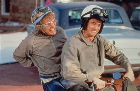 dumb and dumber scooter meme craneimal what s with the waving situation dumb and dumber scooter meme craneimal what s with the waving situation
