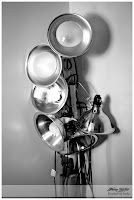 a black and white photo of several flood lights bundled together