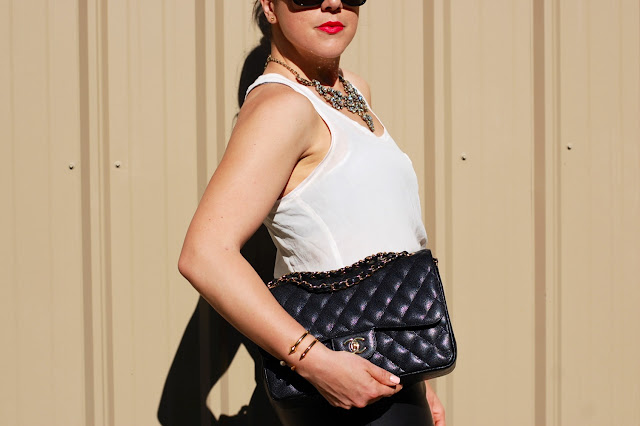 Danier leather skirt,Forever 21 silk tank,Chanel Jumbo classic flap,Zara heels,J.Crew necklace, Prada sunglasses