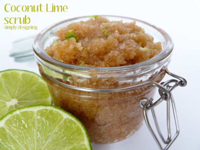 Close up of opened jar showing freshly made Coconut Lime raw sugar scrub sitting next to 2 cut limes