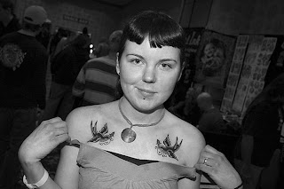 Tattooed Women with Birds on Chest