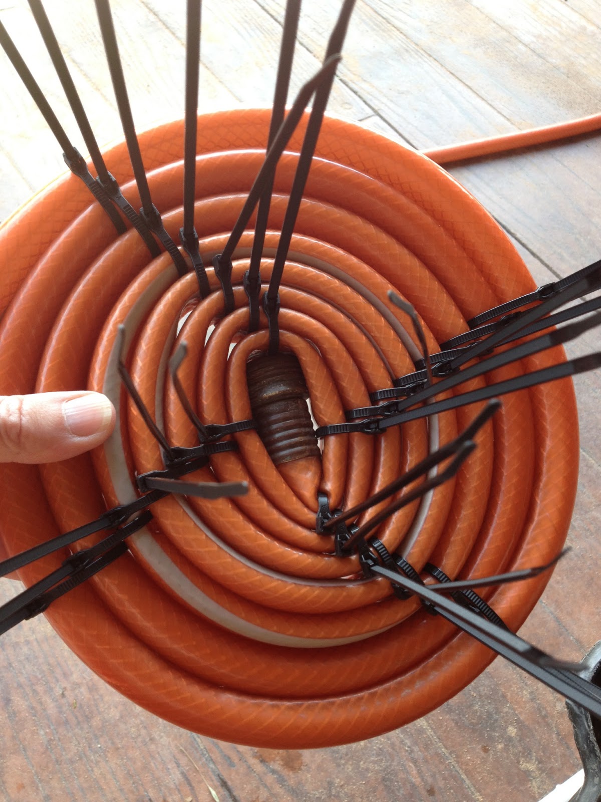 A Building We Shall Go! 1 Old Garden Hose and 201 Zip Ties