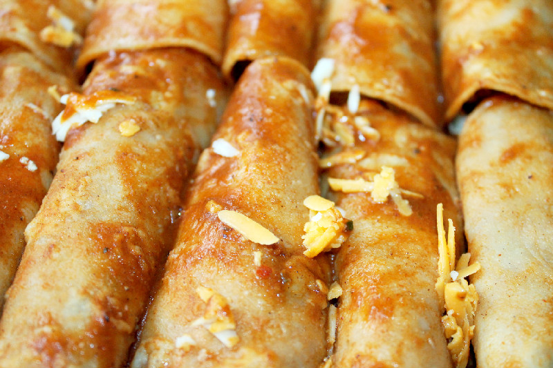 Creole Contessa Smoked Chicken Enchiladas w/ Chili Gravy