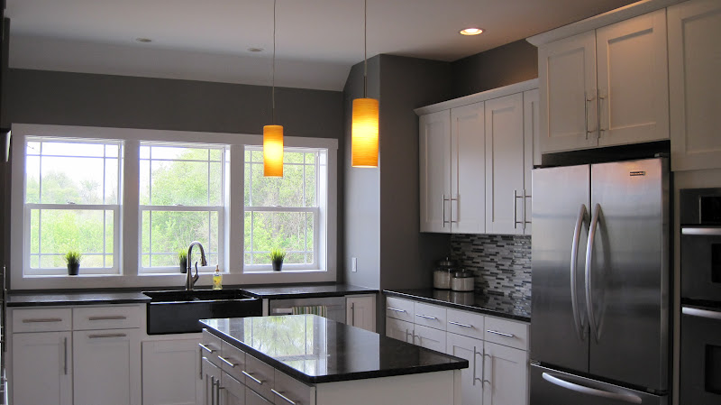 the darker brown cabinets are sinclair we love how the wood floors the darker brown cabinets are sinclair we love how the wood floors