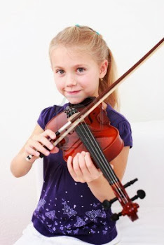 La Claudia toca el violí