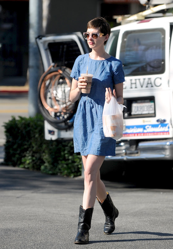 Anne Hathaway Out in West Hollywood wearing a blue dress and sunglasses