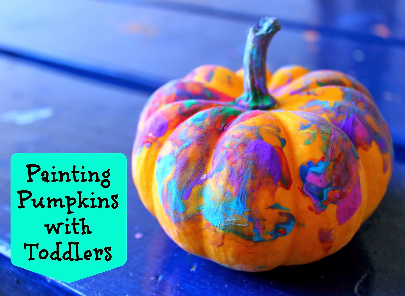 Painting Pumpkins with Toddlers Bare Feet on the Dashboard