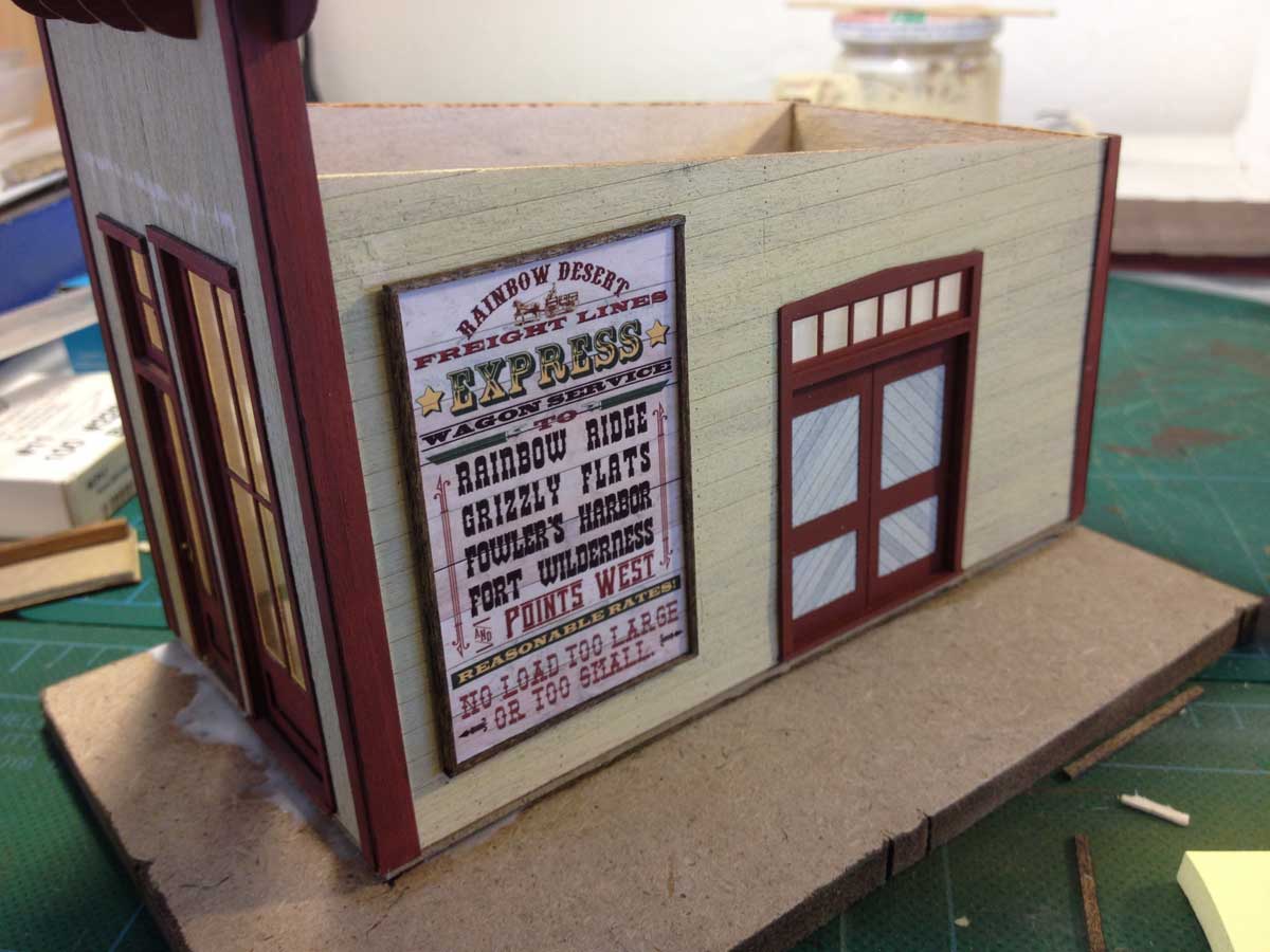 the freight door was cemented into place with acc and the transom windows glassed with frosted acrylic a new foundation was created from 1 4 thick mdf