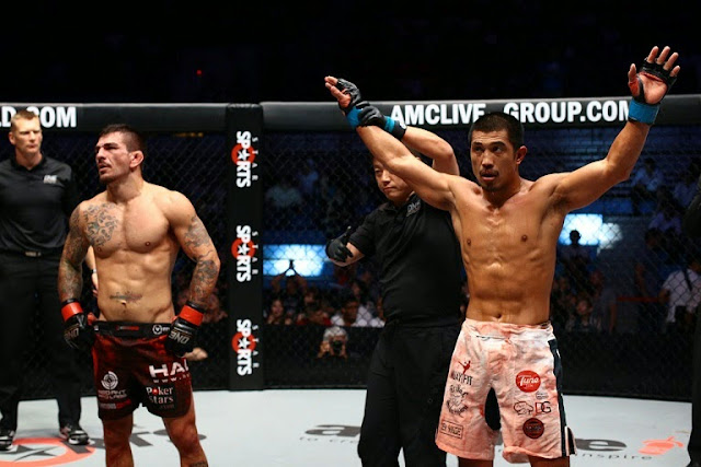 Eric Kelly's hand raised after official results of the main event was announced. Eric Kelly defeats Rob Lisita in ONE FC 18 War of Dragons taiwan 2014
