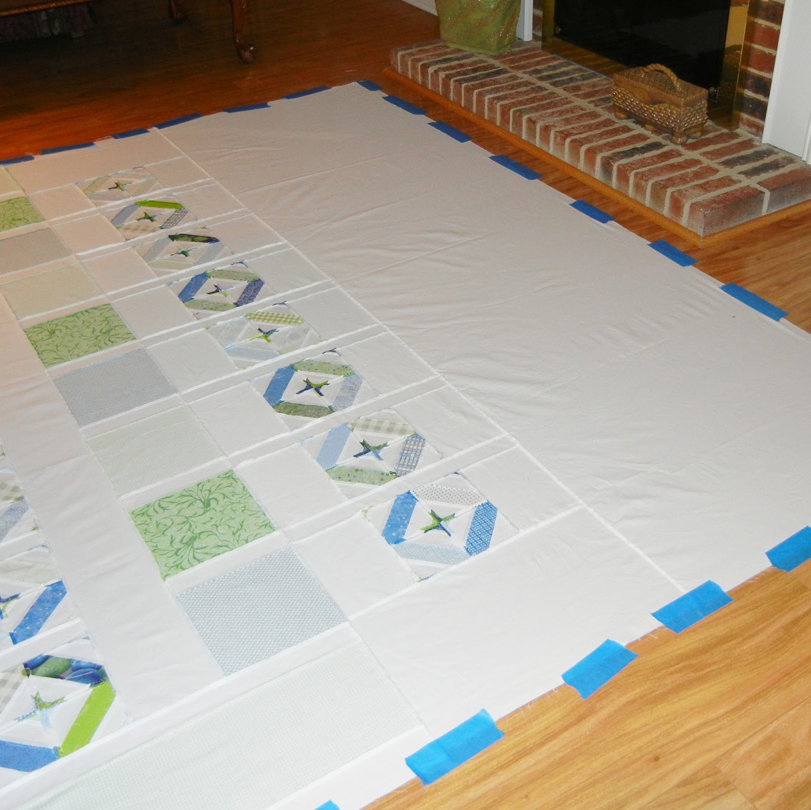 Joanie's Trendy Quilts Tutorial on How to Sandwich a Quilt