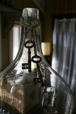 demijohn bottle with antique keys clear demi john bottle jug with old keys