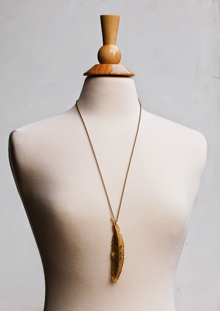 https://www.etsy.com/listing/94051372/gold-feather-pendant-long-necklace?ref=shop_home_active_24&ga_search_query=feather