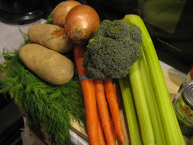 Soup ingredients - Dill, carrots, potatoes, onions, broccoli, and sweet peas