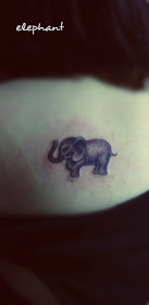 cute lifelike baby elephant tattoo on the back