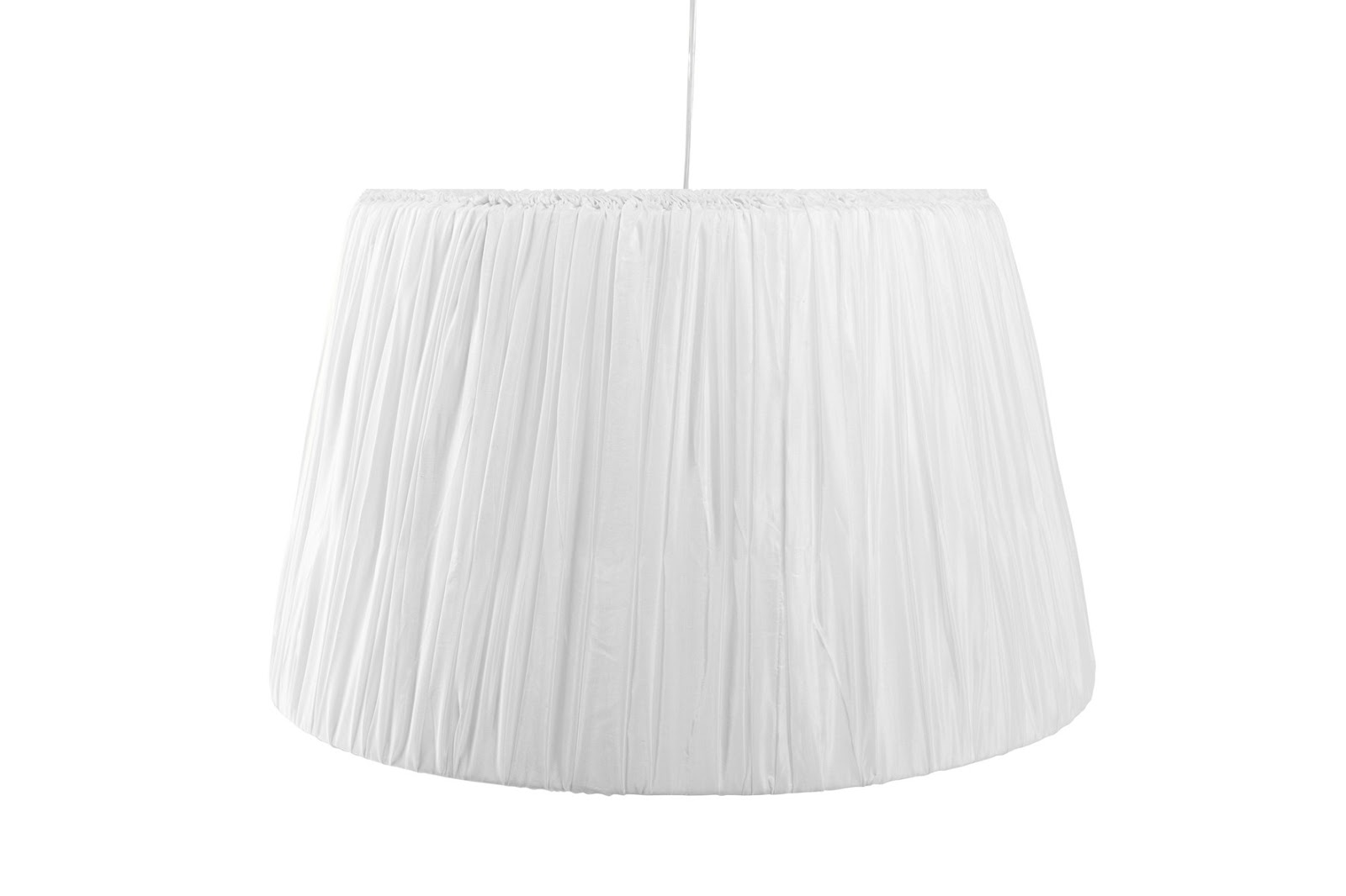 Seng og skrivebord i et Tine k lampe