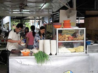 Noodles galore: There’s a row of stalls selling curry laksa and soupy noodles along Jalan Loke Yew in Tanjung Malim.