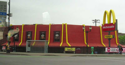 Red and yellow McDonald's roof, no building visible