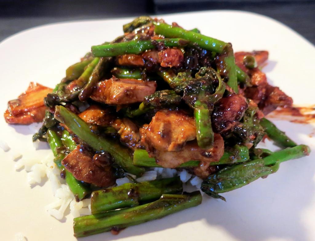 The Foraged Foodie Black Bean Pork with Foraged Milkweed Shoots Recipe