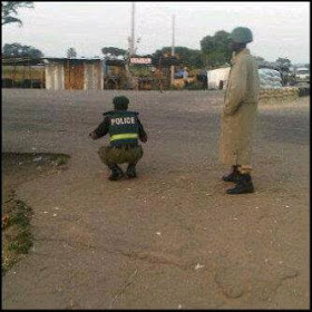 Nigeria Soldier Drilling Policeman