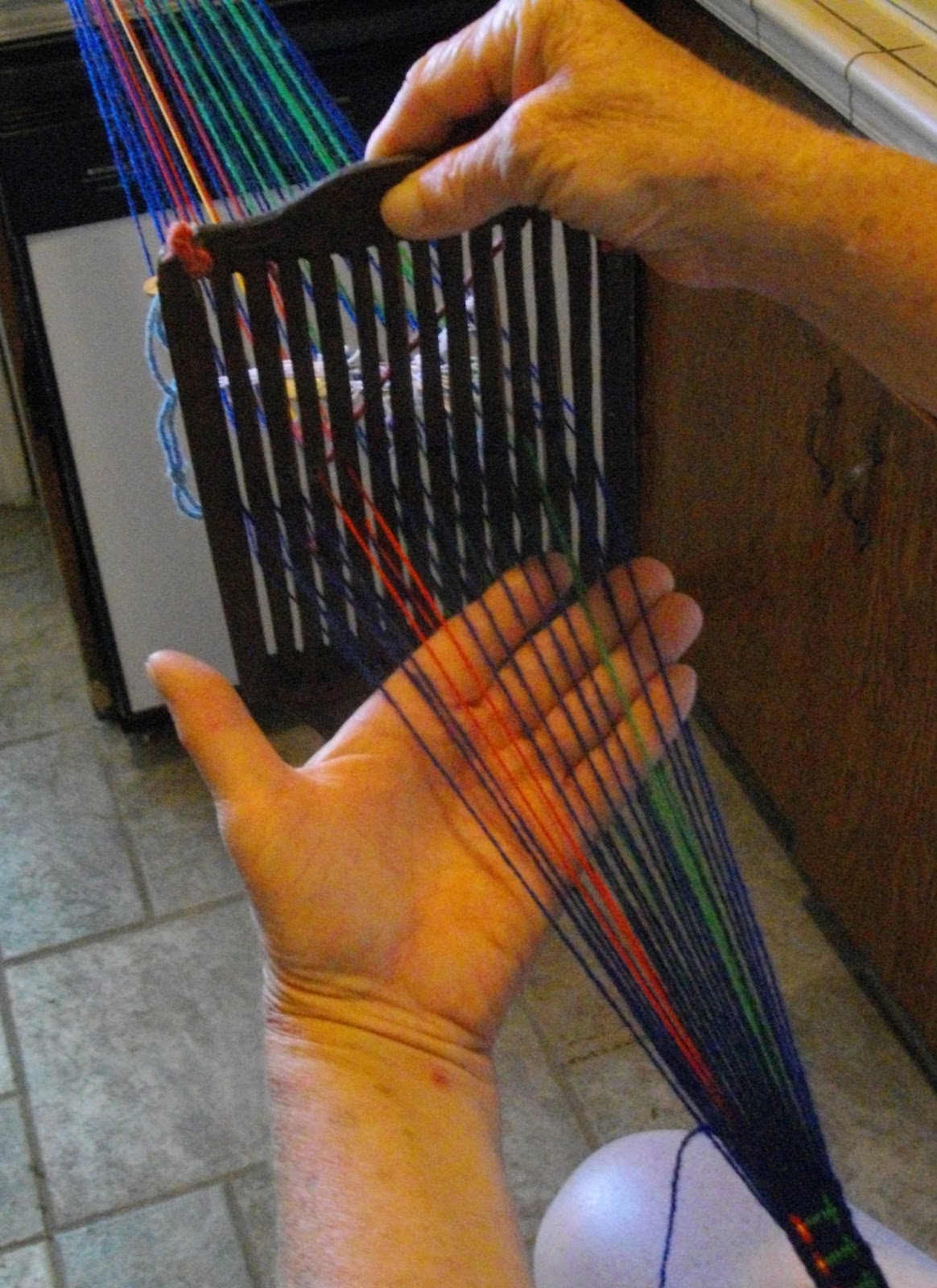 Reggie the Potter... and Tape Loom Weaver Adding an Extra Heddle to