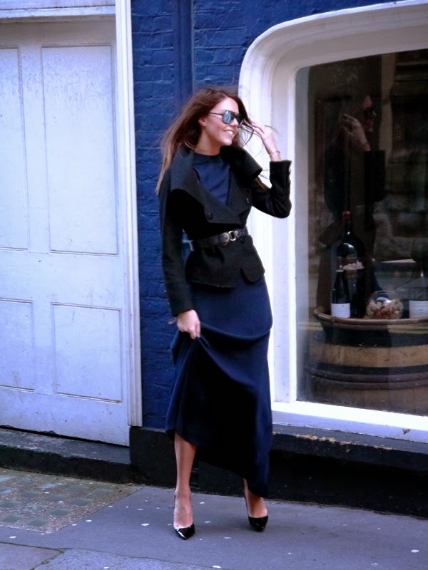 Black wool jacket over navy blue maxi dress with Christian Louboutin Pigalle stilettos and Rayban aviators