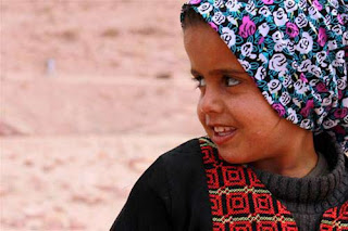 A girl selling souvenirs in Petra.