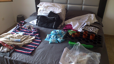Bottom left of the bed is John's stuff, the rest was ours!