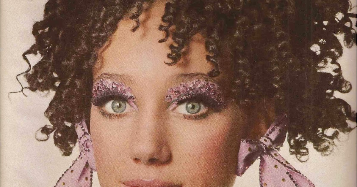 BERENSON BATS HER EYES