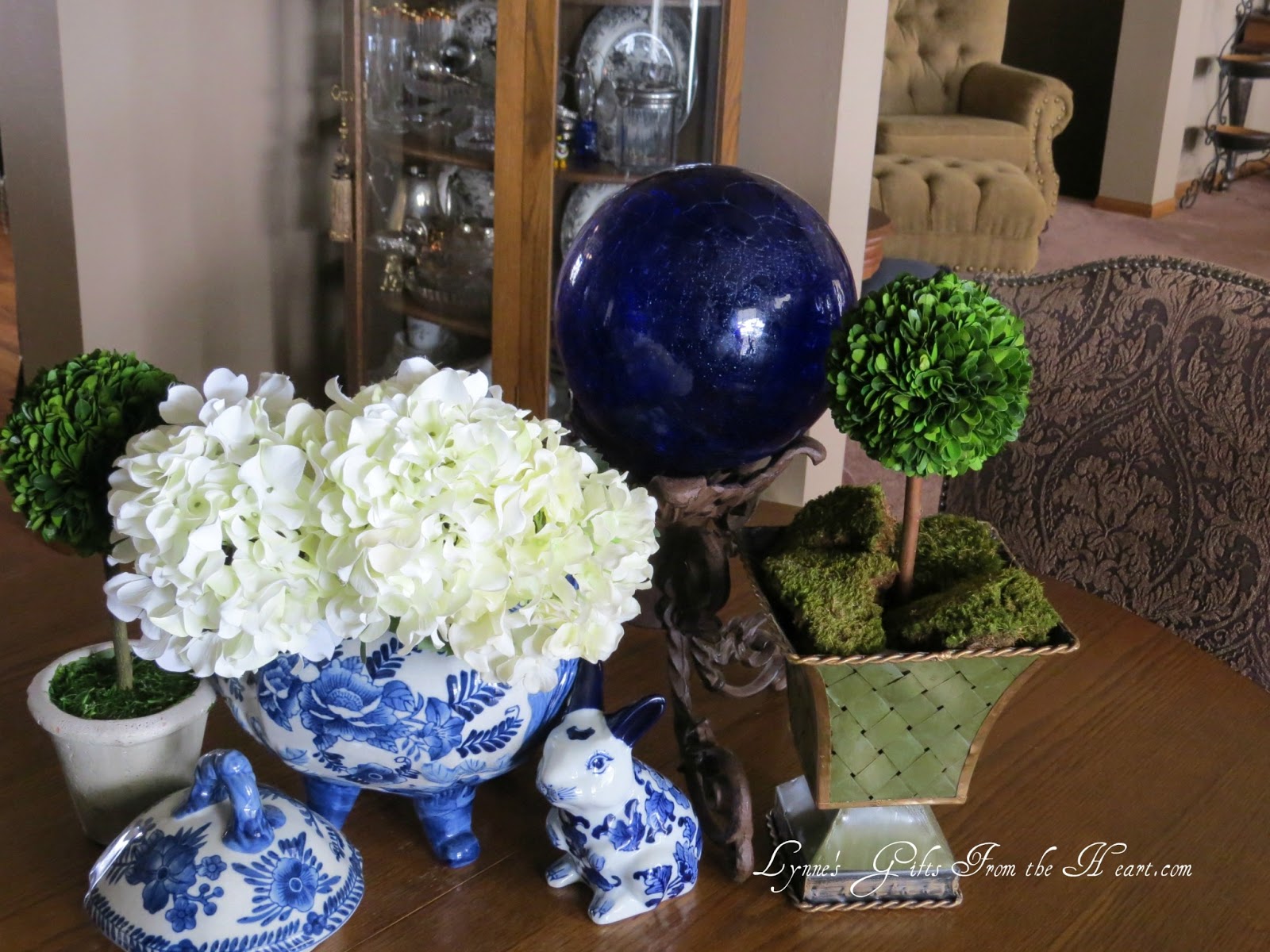 Lynne's Gifts From the Heart Garden Ornaments On the Dining Room Table
