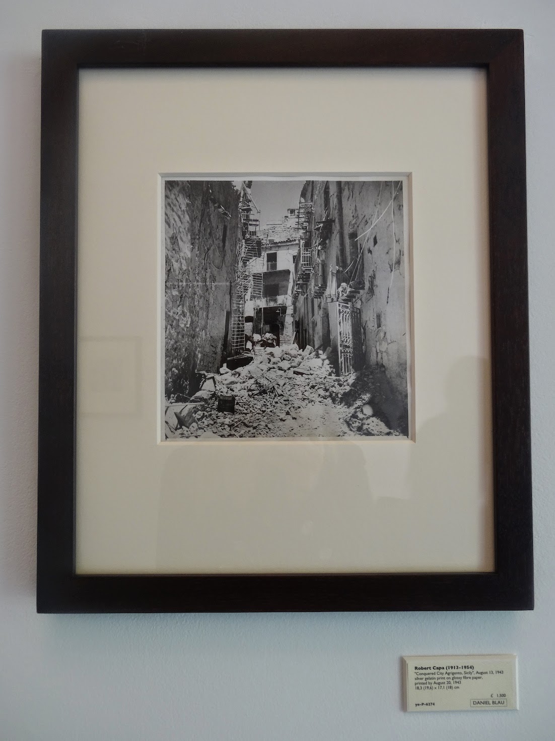 Robert Capa - Conquered City Agrigento, Sicily Robert Capa - Ruined street in Sicily
