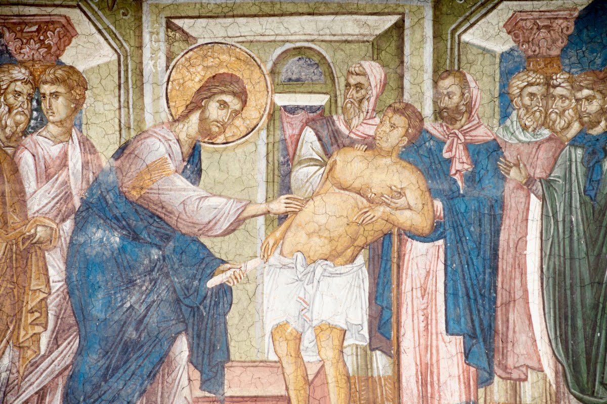 Jesus healing the sick.