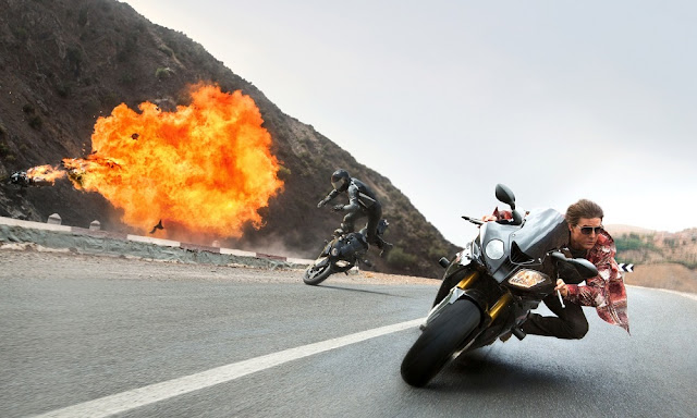 Tom Cruise is back as Ethan Hunt and still doing his own stunts. Mission Impossible 5 Rogue Nation still tom cruise bike