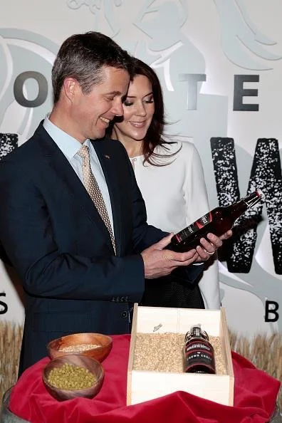 Crown Prince Couple Frederik and Mary are presented a beer named "Crown Royal", brewed especially for their visit