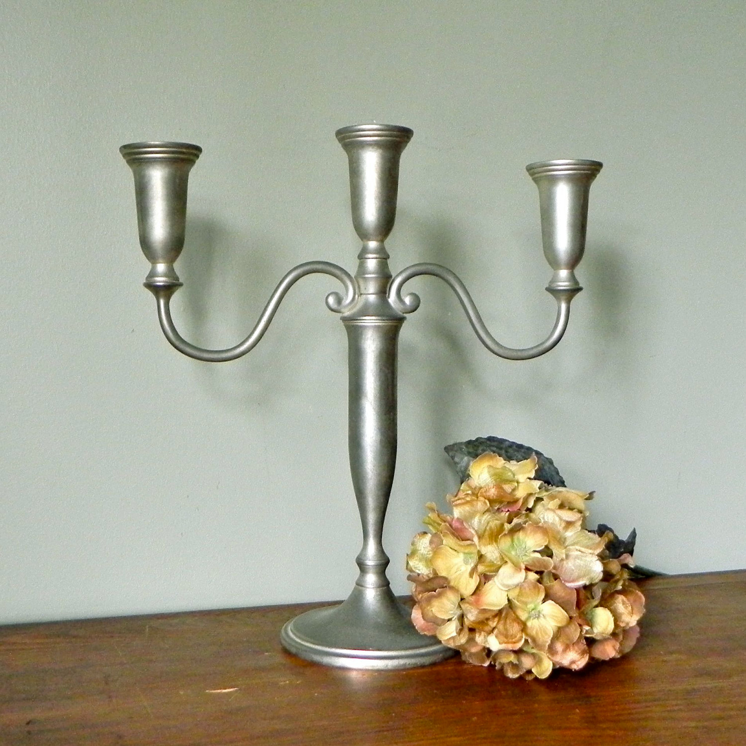 “Simplicity is the keynote of all true elegance.” Candle Stands