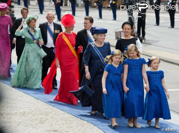 Dutch King Willem-Alexander and his wife Queen Maxima arrive to attend a religious ceremony at the Nieuwe Kerk church in Amsterdam