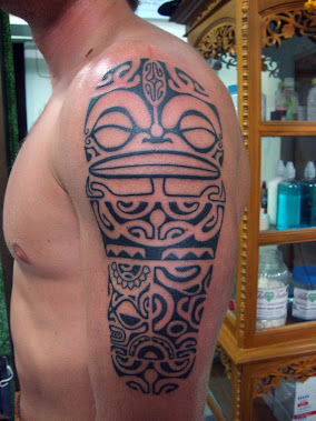 polynesian tiki tattoo half sleeve