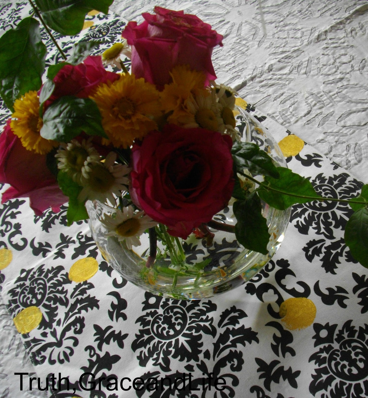 Truth, Grace and Life Flower arrangement with pink, white and yellow