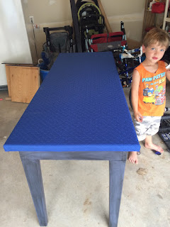 Installed gaming fabric on a gaming table. Installed gaming felt on the upcycled gaming table.