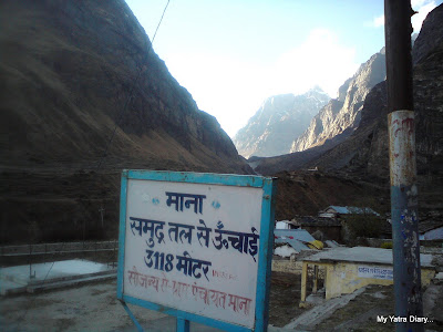A board displaying the Height of Mana Village in the Himalayas