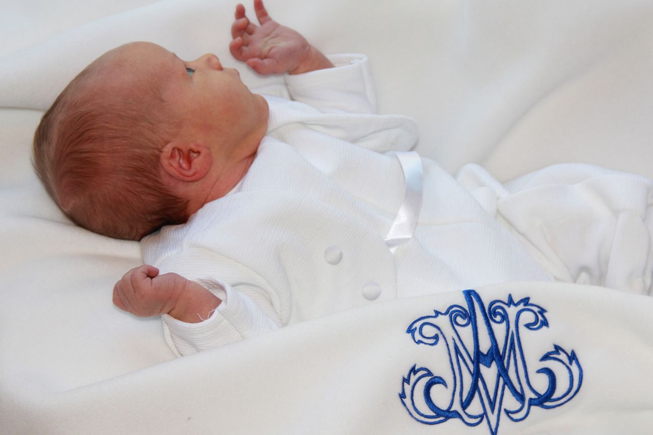 Shower of Roses Our Baptized Baby and a Beautiful Baptismal Blanket