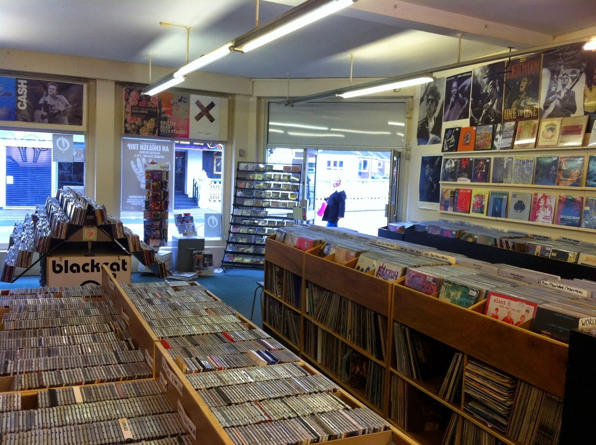 A left ear, a right ear and a VINYL FRONTIER Blackcat Records Taunton