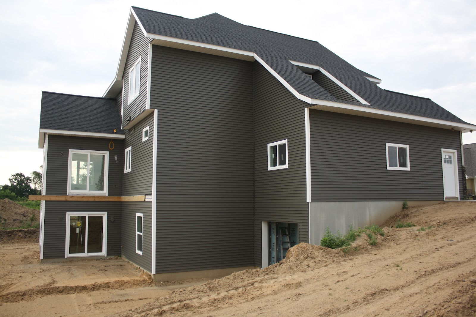 House on Tufton The Build Exterior Stone, Siding, and Driveway Oh My!