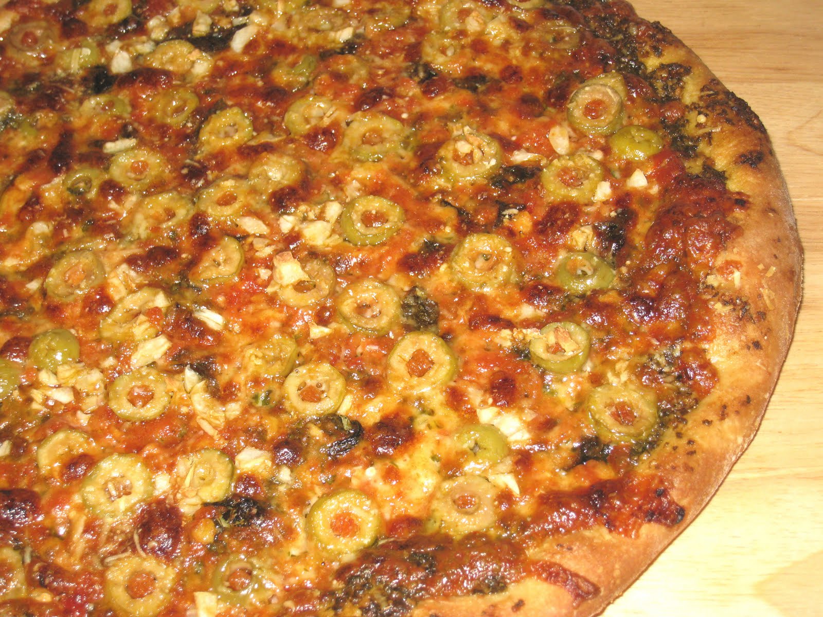 Cooking without a Net Cheese Pizza with Marinara Sauce and Pesto