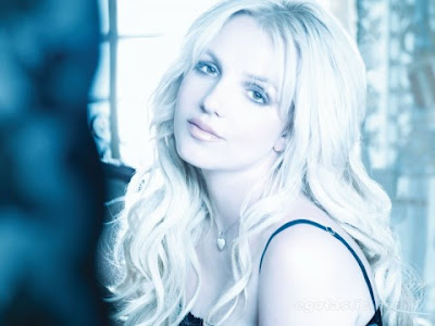 All Curvy Britney Spears in Femme Fatale Photoshoot. Cleavage that we all love!