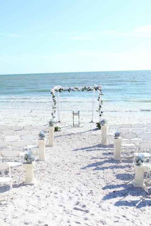 Our beach wedding arch setups are comprised of natural Bamboo Our beach wedding arch setups are comprised of natural Bamboo